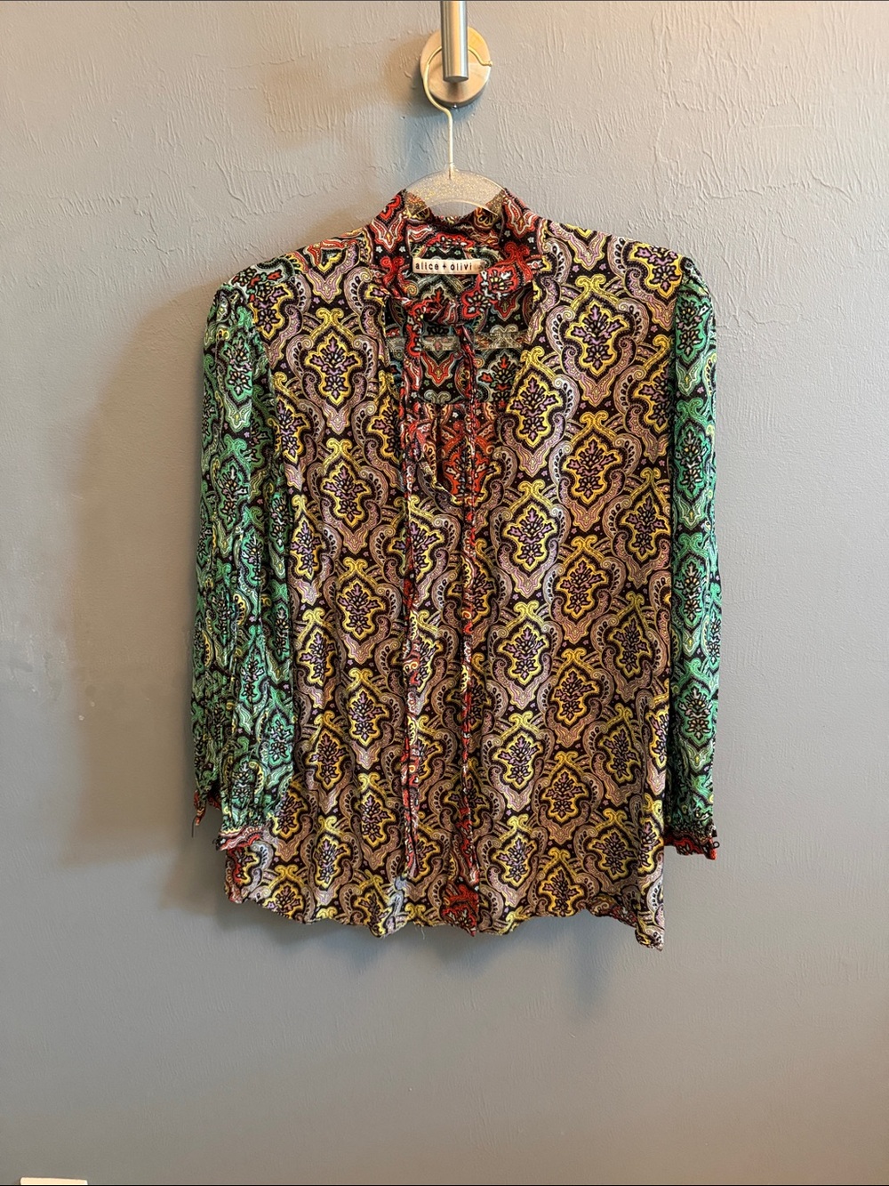 Alice + Olivia Paisley-Print Ruffle Front Blouse (missing buttons on sleeve)